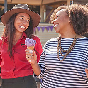 Two people enjoying lavendar ice cream