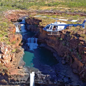 Helicopter hovering over Mitchell Falls