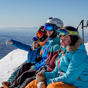 A family enjoying the views in their ski gear at Mt Hutt, New Zealand