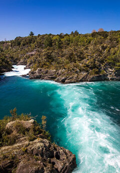 The turbualant water as it flows through the Huka Falls. A waterfall near Taupo