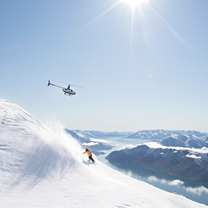 Snowboarder enjoying great winter conditions in Treble Cone